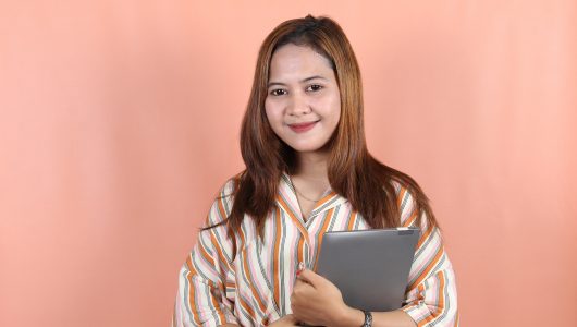 Image,Of,Young,Asian,Woman,,Company,Worker,,Smiling,And,Holding