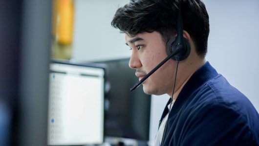 Close,Up,Young,Call,Center,Asian,Man,Wear,Headset,And